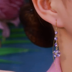 Elegant Gold-Toned Dangling Earrings with Purple Gemstone Clusters and Delicate Wirework