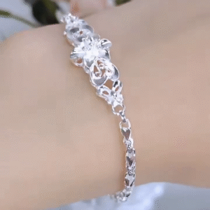 Elegant Sterling Silver Floral Link Bracelet with Intricate Openwork Design