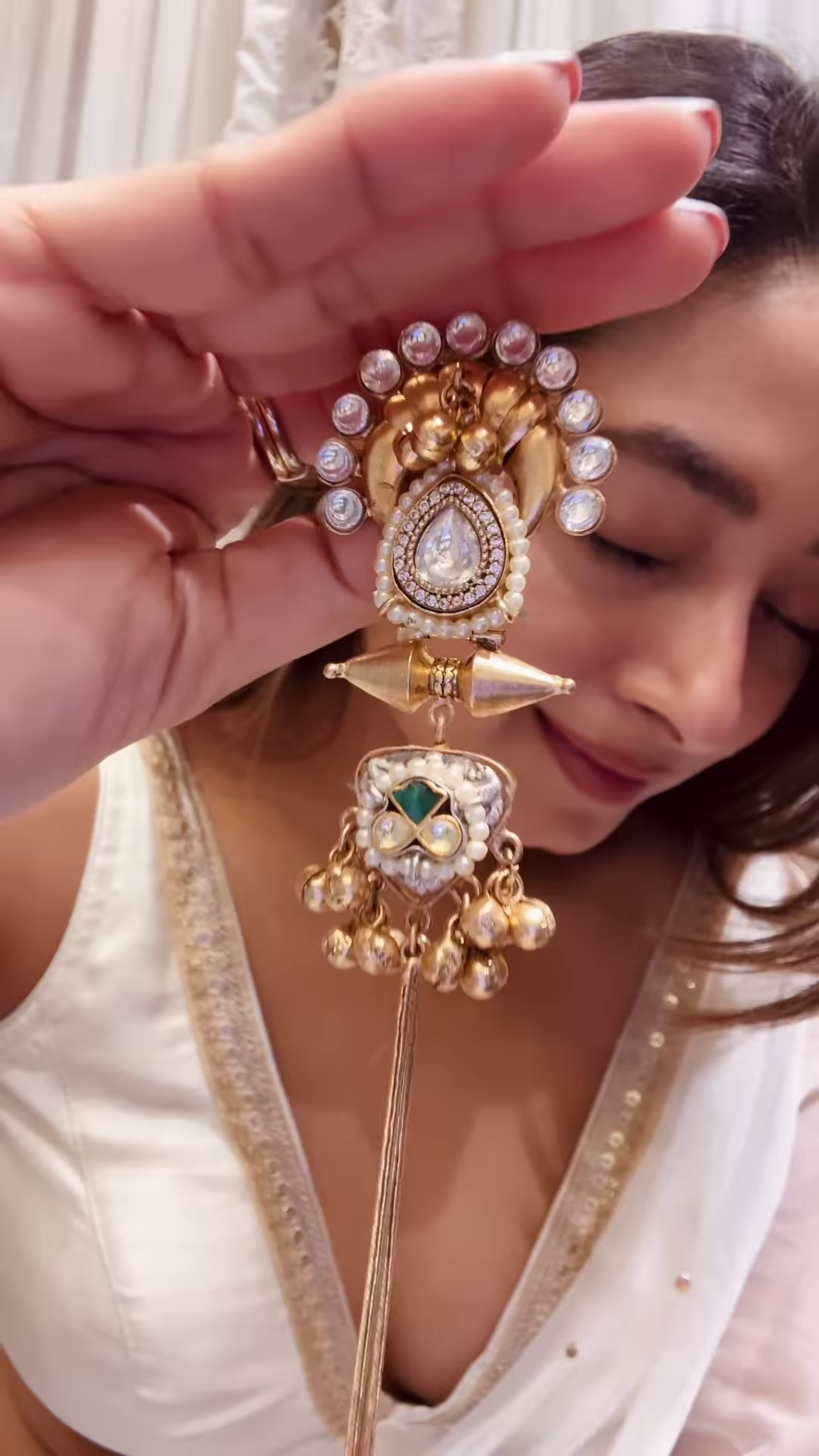 Elegant Gold-Toned Statement Earrings with Intricate Detailing and Chain Drapes - Image 3