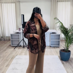 Bohemian Chic Outfit: Patterned Overshirt, Knit Top, and Wide-Leg Pants