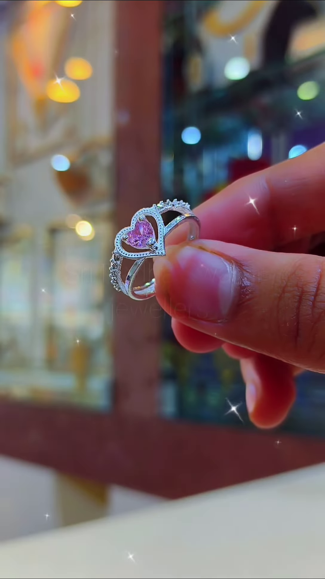 Elegant Heart-Cut Pink Gemstone Ring with Sparkling Accents - Image 2