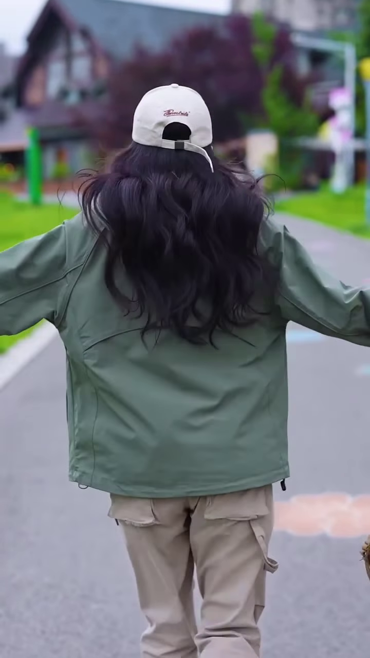 Green Zip-Up Casual Jacket π§₯π³ β Styled with White Tee & Beige Cargo Pants in Outdoor Setting - Image 2