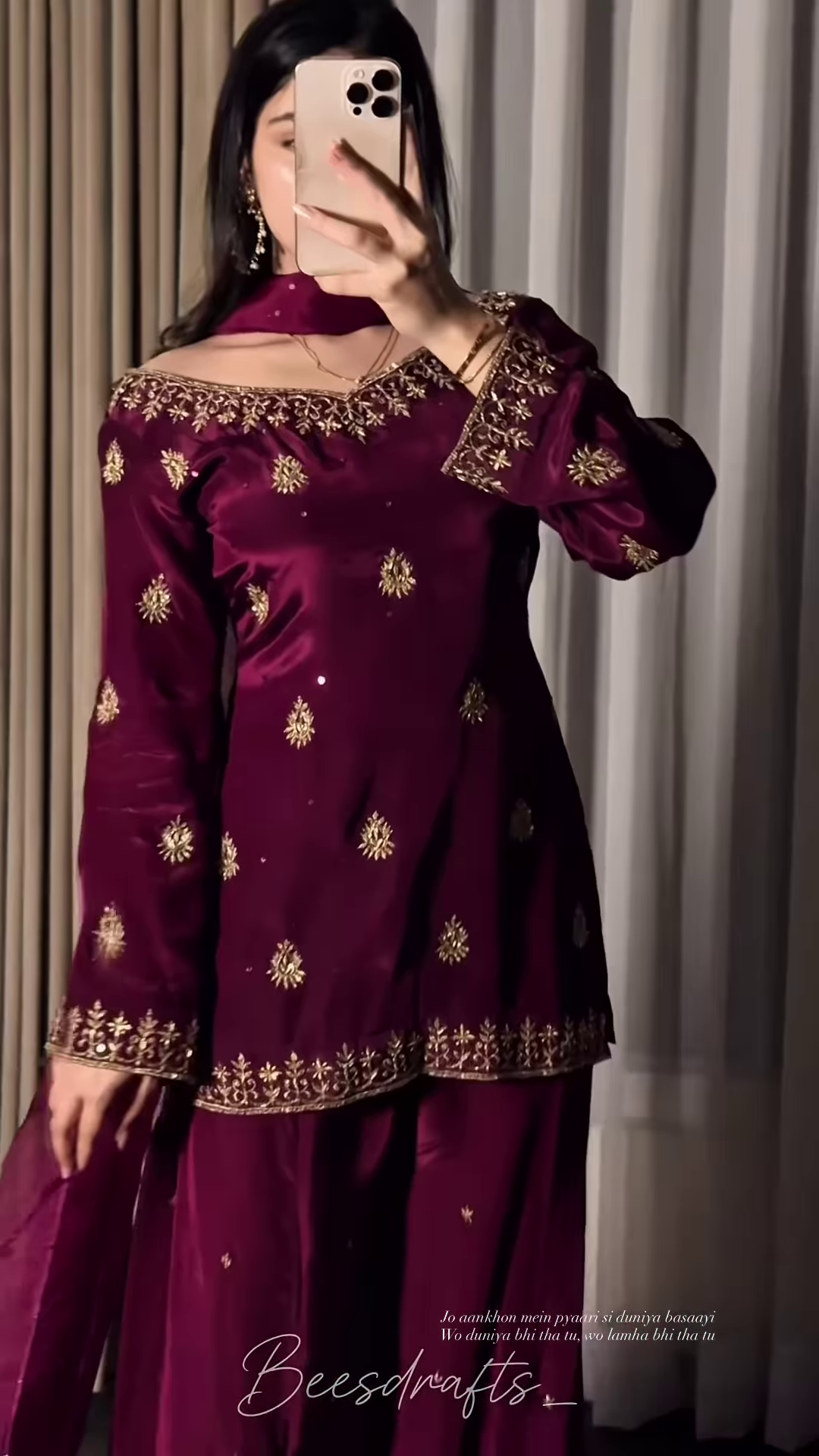 Wine Purple Silk Suit with Golden Butti and Border Work