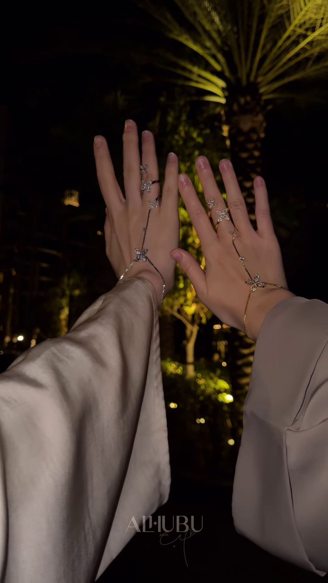 Elegant Gold-Toned Hand Chain Bracelets with Sparkling Floral and Star Accents - Adjustable Finger Rings - Image 2