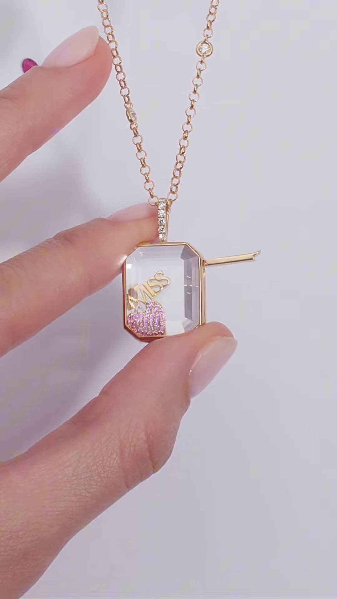 Whimsical Gold-Toned Shaker Necklace with Floating Pink Bag and Gold "BOSS" Charm